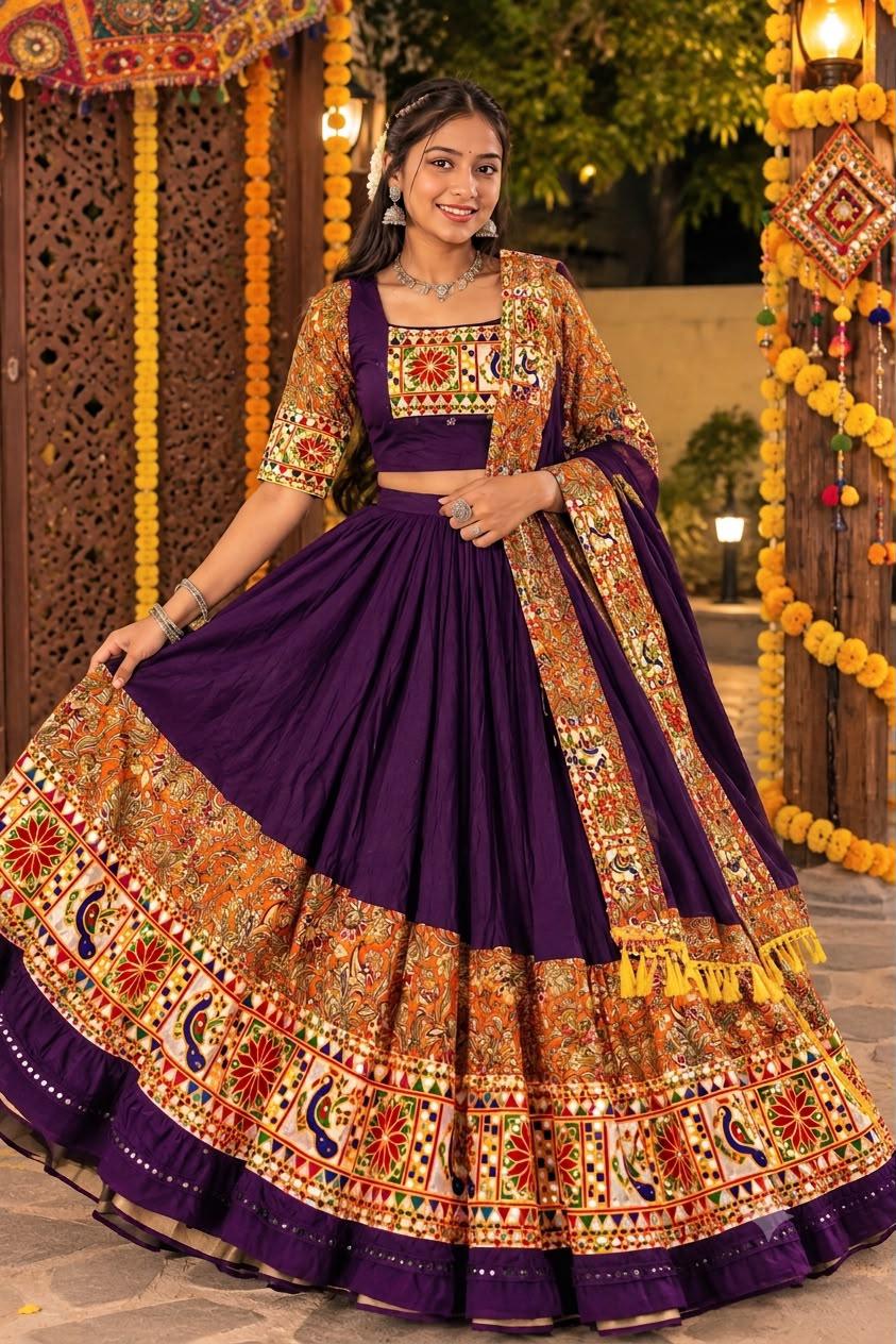Purple chaniya choli with a wide peacock and mirror border